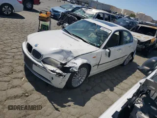 2002 BMW 3 Series 330i with VIN WBAEV53482KM18233, listed as a Copart auction lot 69631934 with 228,157 mi miles and Non repairable. Bid and sale history available at DreamBid. Image 1.
