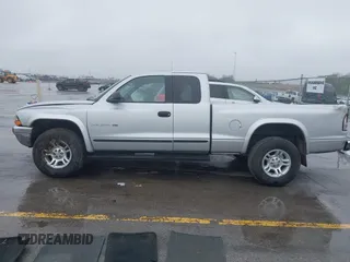 2001 Dodge Dakota Sport с VIN 1B7GG22N31S316805, выставлен на аукционе IAAI как лот 42114986 с пробегом 91 402 миль миль и . История ставок и продаж доступна на DreamBid. Изображение 14.