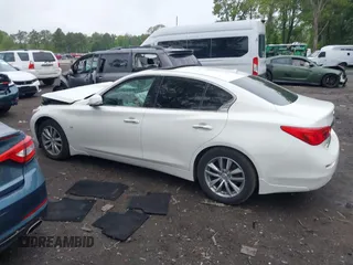 2015 Infiniti Q50 Premium with VIN JN1BV7AR1FM405143, listed as a IAAI auction lot 42267204 with 120,886 mi miles and . Bid and sale history available at DreamBid. Image 14.