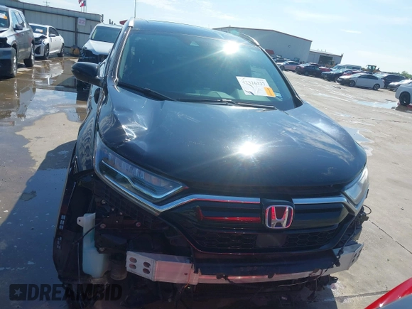2020 Honda CR-V Touring z VIN 7FART6H91LE005707, wystawiony jako IAAI lot #42326337 z przebiegiem 40 555 mil mil oraz . Historia ofert i sprzedaży dostępna na DreamBid. Obrazek 13.