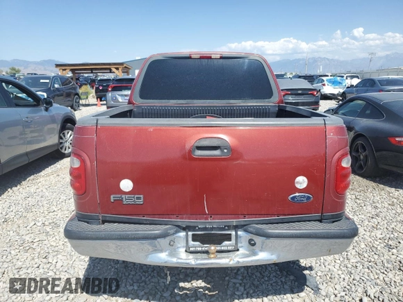 2001 Ford F-150 XLT with VIN 1FTRW07W71KE22482, listed as a Copart auction lot 62546815 with 218,501 mi miles and Clean title. Bid and sale history available at DreamBid. Image 6.