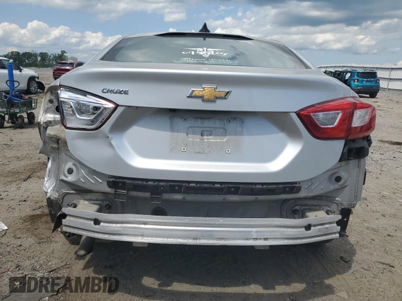 2018 Chevrolet Cruze LS with VIN 1G1BC5SM9J7214287, listed as a Copart auction lot 54958255 with 32,709 mi miles and Salvage Title. Bid and sale history available at DreamBid. Image 6.
