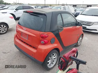 2008 Smart fortwo Pure z VIN WMEEJ31X28K206311, wystawiony jako IAAI lot #42269686 z przebiegiem 48 601 mil mil oraz . Historia ofert i sprzedaży dostępna na DreamBid. Obrazek 4.
