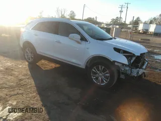 2021 Cadillac XT5 AWD Premium Luxury with VIN 1GYKNDRS2MZ142755, listed as a IAAI auction lot 41300895 with 37,107 mi miles. Bid and sale history available at carsss.com. Image 1.