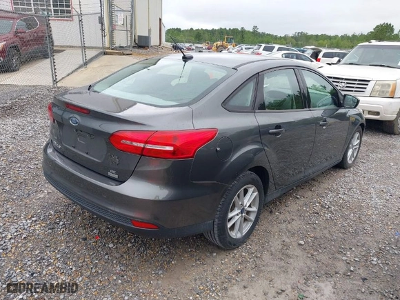 2018 Ford Focus SE with VIN 1FADP3FE9JL275194, listed as a IAAI auction lot 41979690 with 95,383 mi miles. Bid and sale history available at carsss.com. Image 4.