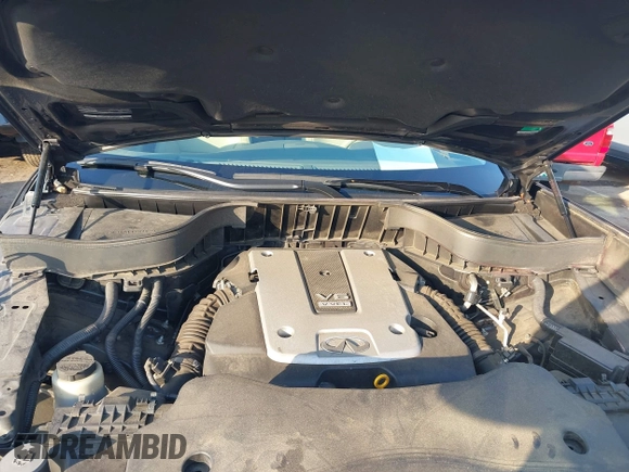 2016 Infiniti QX70 z VIN JN8CS1MW6GM750425, wystawiony jako IAAI lot #42259340 z przebiegiem 79 350 mil mil oraz . Historia ofert i sprzedaży dostępna na DreamBid. Obrazek 10.