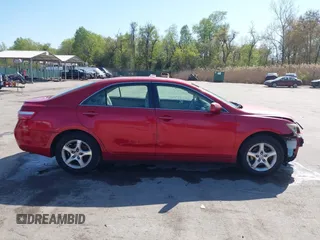 2007 Toyota Camry CE with VIN JTNBE46K073031988, listed as a IAAI auction lot 42062321 with 238,925 mi miles. Bid and sale history available at carsss.com. Image 14.
