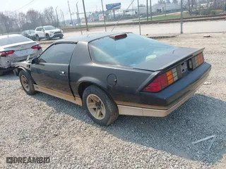 1986 Chevrolet Camaro Z28 Sport with VIN 1G1FP87F3GN132044, listed as a IAAI auction lot 41899252 with 92,424 mi miles. Bid and sale history available at carsss.com. Image 3.