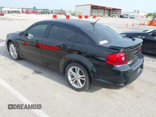 2014 Dodge Avenger SE with VIN 1C3CDZAB6EN155429, listed as a IAAI auction lot 42773351 with 156,482 mi miles and . Bid and sale history available at DreamBid. Image 3.