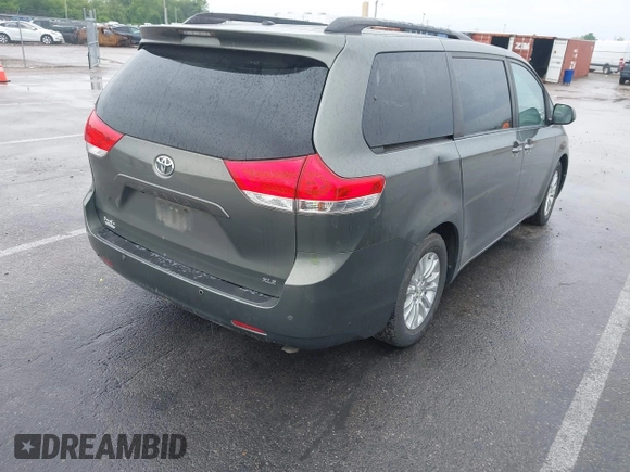 2011 Toyota Sienna XLE AAS with VIN 5TDYK3DC7BS041020, listed as a IAAI auction lot 42218328 with Not Provided miles and . Bid and sale history available at DreamBid. Image 4.