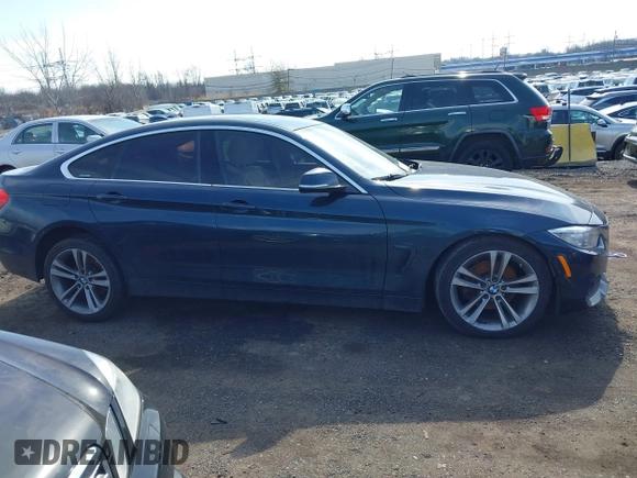 2016 BMW 4 Series 428i xDrive with VIN WBA4C9C56GG141089, listed as a IAAI auction lot 41587479 with 85,462 mi miles and . Bid and sale history available at DreamBid. Image 13.