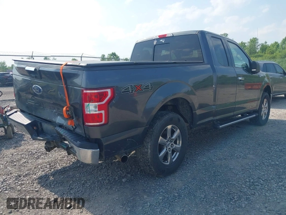 2018 Ford F-150 XL with VIN 1FTFX1E58JFD92806, listed as a IAAI auction lot 42424589 with 144,476 mi miles and . Bid and sale history available at DreamBid. Image 4.