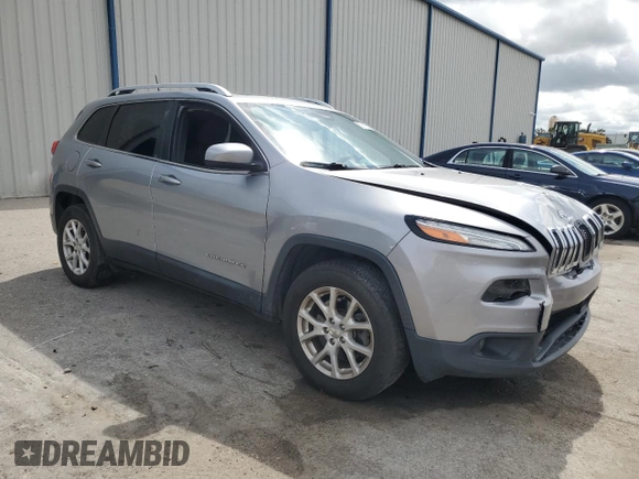 2017 Jeep Cherokee Latitude with VIN 1C4PJMCS9HW634285, listed as a Copart auction lot 59107615 with 136,984 mi miles and Salvage title. Bid and sale history available at DreamBid. Image 4.