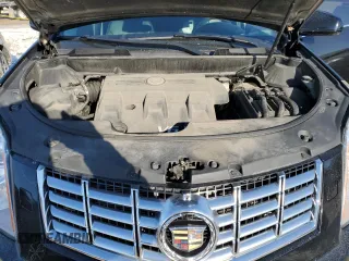 2014 Cadillac SRX Premium Collection z VIN 3GYFNGE38ES577313, wystawiony jako Copart lot #87679045 z przebiegiem 92 070 mil mil oraz Szkoda całkowita • Salvage title. Historia ofert i sprzedaży dostępna na DreamBid. Obrazek 11.