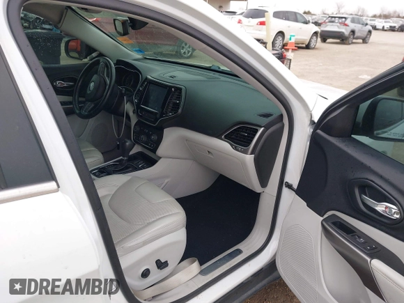 2019 Jeep Cherokee Limited with VIN 1C4PJLDB4KD346296, listed as a IAAI auction lot 41364345 with 171,855 mi miles and . Bid and sale history available at DreamBid. Image 5.
