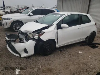 2015 Toyota Yaris L with VIN VNKJTUD31FA055123, listed as a Copart auction lot 42201615 with 131,127 mi miles and Salvage Title. Bid and sale history available at carsss.com. Image 1.