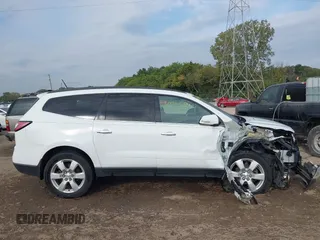 2017 Chevrolet Traverse LT with VIN 1GNKRGKD4HJ338716, listed as a IAAI auction lot 40265414 with 131,097 mi miles and . Bid and sale history available at DreamBid. Image 13.