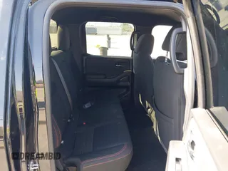 2024 Nissan Frontier SL with VIN 1N6ED1EJ4RN650125, listed as a IAAI auction lot 42193443 with 14,282 mi miles and . Bid and sale history available at DreamBid. Image 8.