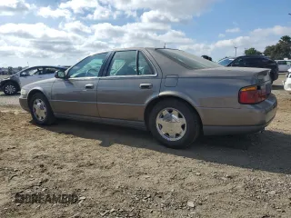 1998 Cadillac Seville SLS z VIN 1G6KS54YXWU931108, wystawiony jako Copart lot #72369984 z przebiegiem 103 267 mil mil oraz Szkoda całkowita • Salvage title. Historia ofert i sprzedaży dostępna na DreamBid. Obrazek 2.