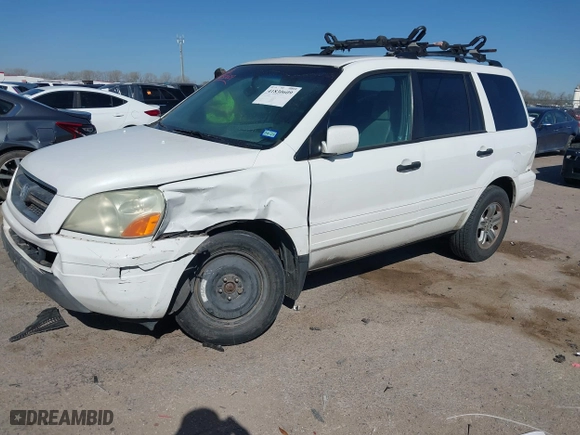 2005 Honda Pilot EX-L with NAVI with VIN 2HKYF18775H571312, listed as a IAAI auction lot 41830609 with 297,923 mi miles. Bid and sale history available at carsss.com. Image 17.