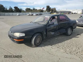 1993 Toyota Camry LE with VIN JT2SK12E4P0112014, listed as a Copart auction lot 52822095 with 249,458 mi miles and Salvage Title. Bid and sale history available at carsss.com. Image 1.