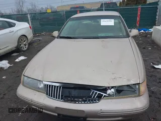 1997 Lincoln Continental with VIN 1LNLM97V3VY666104, listed as a IAAI auction lot 41650904 with 181,536 mi miles. Bid and sale history available at carsss.com. Image 6.