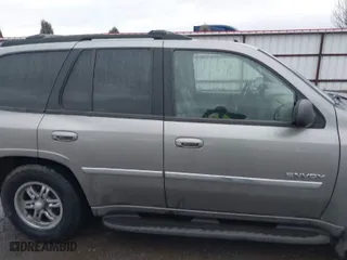 2006 GMC Envoy SLE with VIN 1GKDT13S862232455, listed as a IAAI auction lot 41483418 with 198,267 mi miles. Bid and sale history available at carsss.com. Image 13.