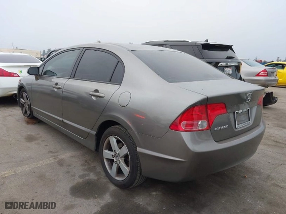 2007 Honda Civic Sdn EX with VIN 1HGFA16867L087102, listed as a IAAI auction lot 42021975 with 174,215 mi miles. Bid and sale history available at carsss.com. Image 3.