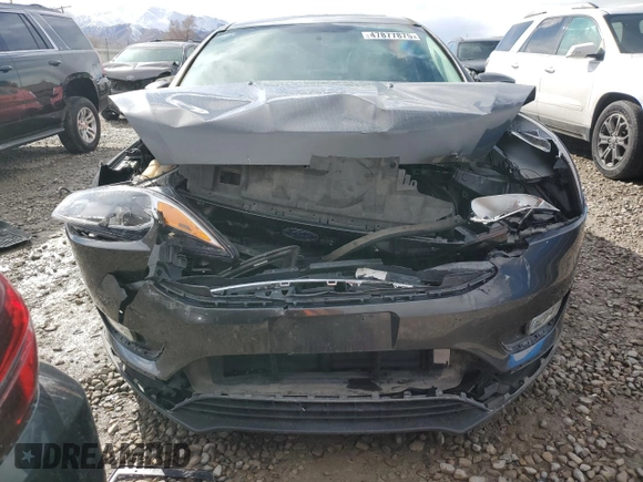 2018 Ford Focus Titanium с VIN 1FADP3J24JL326596, выставлен на аукционе Copart как лот 47877875 с пробегом 59 763 миль миль и Списание • Salvage title. История ставок и продаж доступна на DreamBid. Изображение 5.