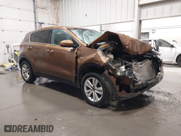 2018 Kia Sportage LX with VIN KNDPMCAC9J7403108, listed as a IAAI auction lot 41946497 with 123,023 mi miles. Bid and sale history available at carsss.com. Image 1.