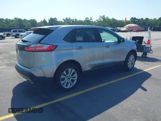 2021 Ford Edge Titanium with VIN 2FMPK3K97MBA15391, listed as a IAAI auction lot 42711656 with 40,723 mi miles and . Bid and sale history available at DreamBid. Image 4.