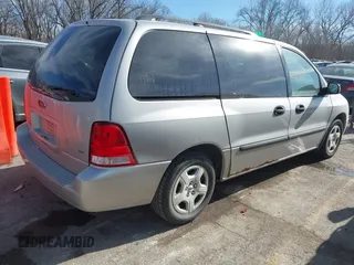 2004 Ford Freestar SE z VIN 2FMZA51634BB15552, wystawiony jako IAAI lot #41448164 z przebiegiem 240 212 mil mil oraz . Historia ofert i sprzedaży dostępna na DreamBid. Obrazek 4.