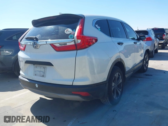 2018 Honda CR-V LX with VIN 2HKRW5H31JH408187, listed as a IAAI auction lot 41623448 with 177,661 mi miles and . Bid and sale history available at DreamBid. Image 4.