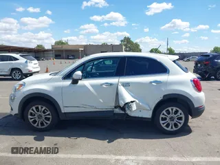2016 FIAT 500X Lounge z VIN ZFBCFXDT0GP333273, wystawiony jako IAAI lot #42269130 z przebiegiem 98 707 mil mil oraz . Historia ofert i sprzedaży dostępna na DreamBid. Obrazek 14.