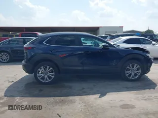 2023 Mazda CX-30 S Carbon Edition with VIN 3MVDMBCM4PM542160, listed as a IAAI auction lot 42175395 with 11,340 mi miles and . Bid and sale history available at DreamBid. Image 13.