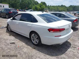 2020 Volkswagen Passat 2.0T S with VIN 1VWAA7A35LC012759, listed as a IAAI auction lot 39909072 with 50,690 mi miles. Bid and sale history available at carsss.com. Image 3.