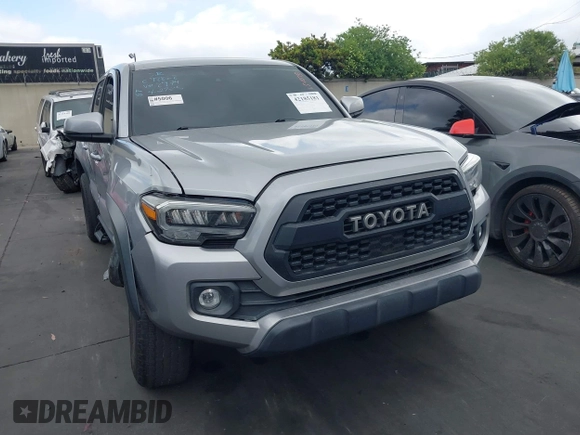 2020 Toyota Tacoma SR5 z VIN 3TMCZ5AN6LM288974, wystawiony jako IAAI lot #42185181 z przebiegiem 94 759 mil mil oraz . Historia ofert i sprzedaży dostępna na DreamBid. Obrazek 12.