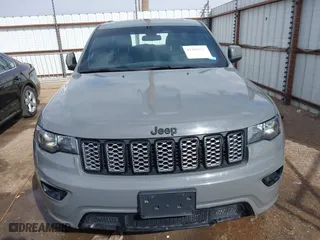 2021 Jeep Grand Cherokee Laredo X with VIN 1C4RJEAG5MC824738, listed as a IAAI auction lot 41580995 with 57,923 mi miles. Bid and sale history available at carsss.com. Image 13.