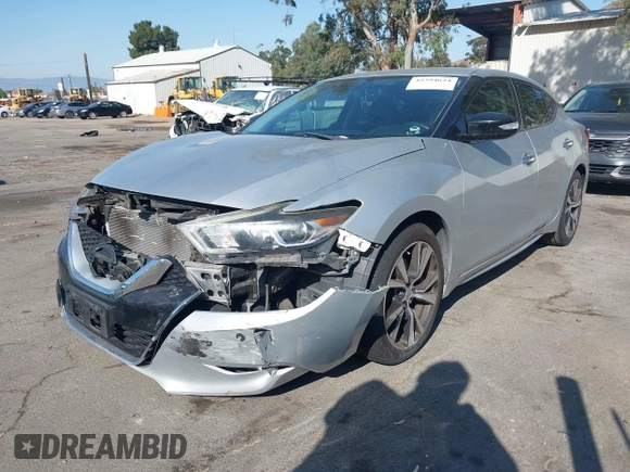 2017 Nissan Maxima Platinum with VIN 1N4AA6AP2HC414204, listed as a IAAI auction lot 42394624 with 80,486 mi miles and . Bid and sale history available at DreamBid. Image 2.