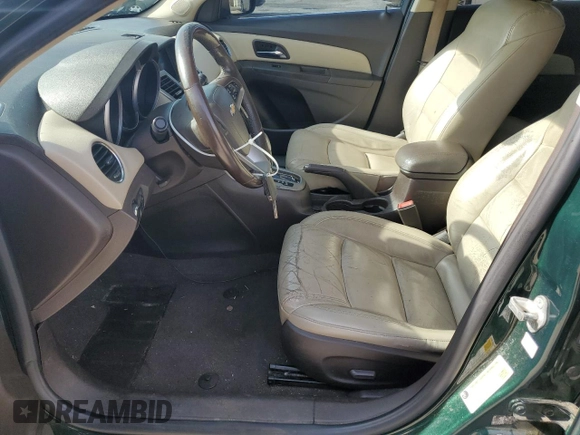 2014 Chevrolet Cruze 2LT with VIN 1G1PE5SB6E7249342, listed as a Copart auction lot 56517825 with 157,770 mi miles and Clean title. Bid and sale history available at DreamBid. Image 7.