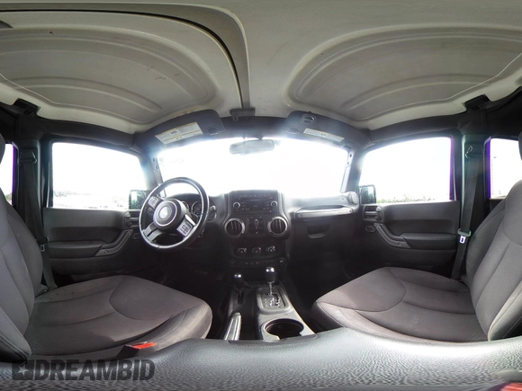 2015 Jeep Wrangler Unlimited Willys Wheeler with VIN 1C4BJWDG4FL687829, listed as a IAAI auction lot 42099147 with 98,969 mi miles and . Bid and sale history available at DreamBid. Image 19.