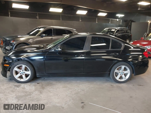 2014 BMW 3 Series 328i xDrive with VIN WBA3B3G50ENR83599, listed as a IAAI auction lot 42106340 with 195,309 mi miles. Bid and sale history available at carsss.com. Image 14.