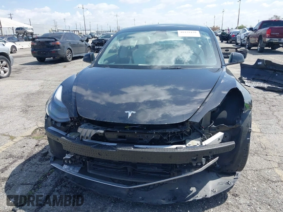 2022 Tesla Model 3 with VIN 5YJ3E1EA4NF316127, listed as a IAAI auction lot 41939191 with 30,857 mi miles. Bid and sale history available at carsss.com. Image 6.