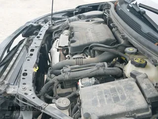 2016 Chevrolet Cruze LT z VIN 1G1BE5SM3G7299601, wystawiony jako IAAI lot #42980862 z przebiegiem 170 195 mil mil oraz . Historia ofert i sprzedaży dostępna na DreamBid. Obrazek 12.