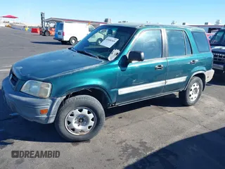 1999 Honda CR-V LX with VIN JHLRD1847XC031475, listed as a IAAI auction lot 41606369 with 254,445 mi miles. Bid and sale history available at carsss.com. Image 2.