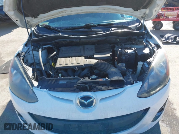 2012 Mazda 2 Touring z VIN JM1DE1LY2C0134281, wystawiony jako IAAI lot #41613690 z przebiegiem 156 546 mil mil oraz . Historia ofert i sprzedaży dostępna na DreamBid. Obrazek 10.