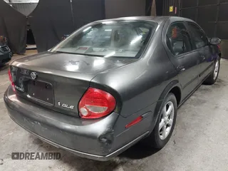2001 Nissan Maxima SE with VIN JN1CA31A91T112866, listed as a IAAI auction lot 42372546 with 156,069 mi miles and . Bid and sale history available at DreamBid. Image 4.