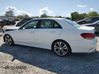 2014 Mercedes-Benz E 350 Sport with VIN WDDHF5KB8EA828799, listed as a Copart auction lot 52600805 with 113,755 mi miles and Salvage Title. Bid and sale history available at DreamBid. Image 2.