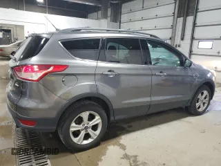 2013 Ford Escape SE with VIN 1FMCU9G96DUB33138, listed as a Copart auction lot 61851665 with 148,742 mi miles and Salvage title. Bid and sale history available at DreamBid. Image 3.