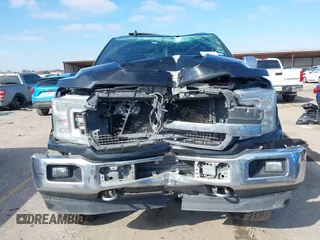 2018 Ford F-150 XL z VIN 1FTEW1EG9JFC27573, wystawiony jako IAAI lot #41626805 z przebiegiem 153 814 mil mil oraz . Historia ofert i sprzedaży dostępna na DreamBid. Obrazek 12.